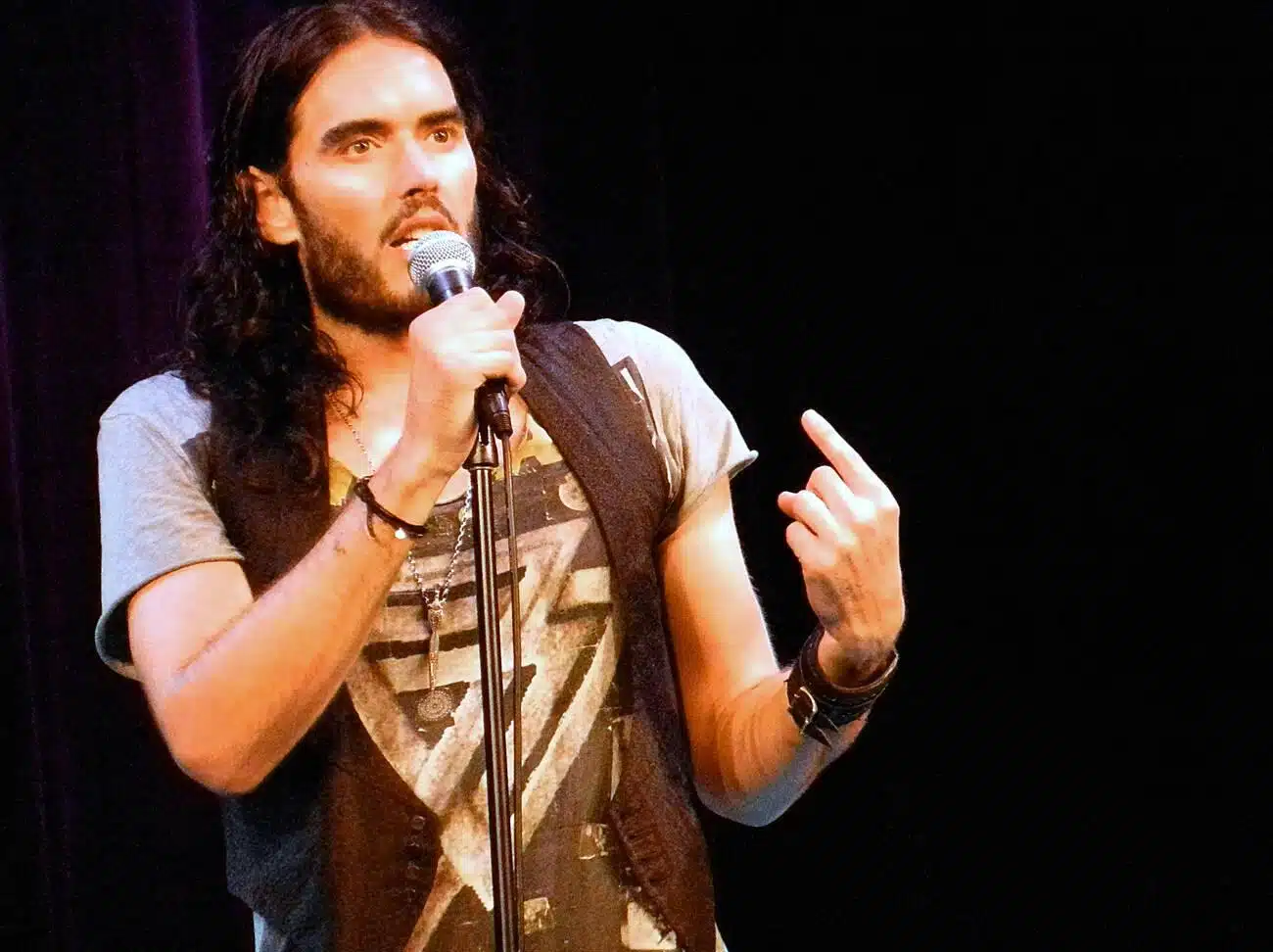 russell brand performing on stage