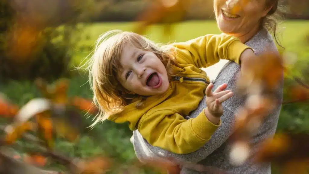Toddler Playing With Mothe