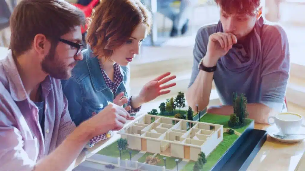 architect brainstorming building model office