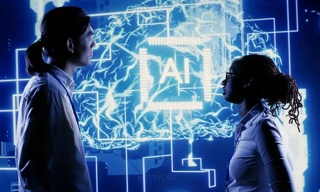 Two people looking at a digital screen displaying an AI graphic