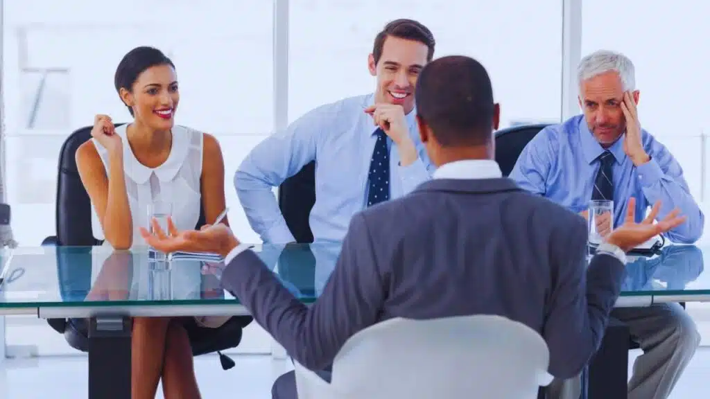 Man gesturing during an job interview