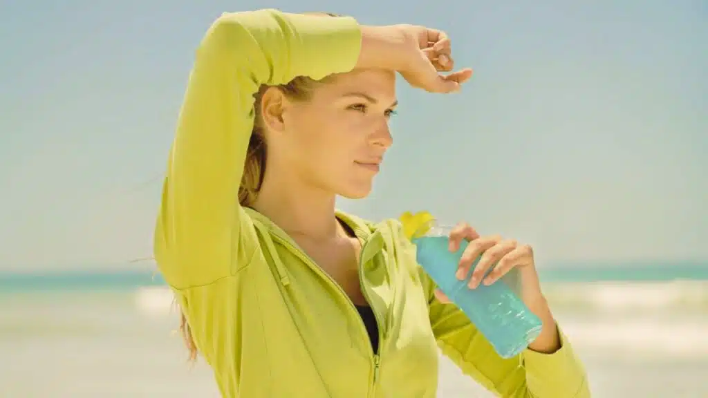 Woman drinking water from a bottle