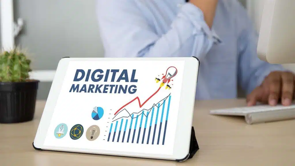 Tablet displaying digital marketing data with graphs and icons.