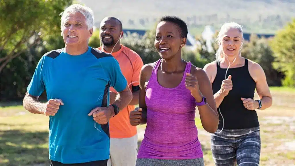 Group of people jogging outdoors for fitness