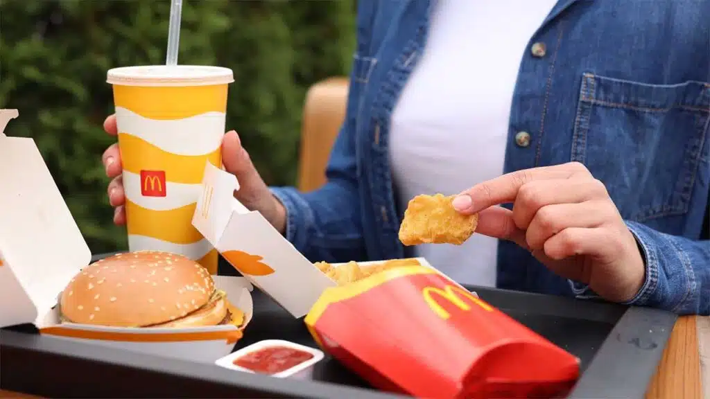 Women are enjoying a McDonald's meal.