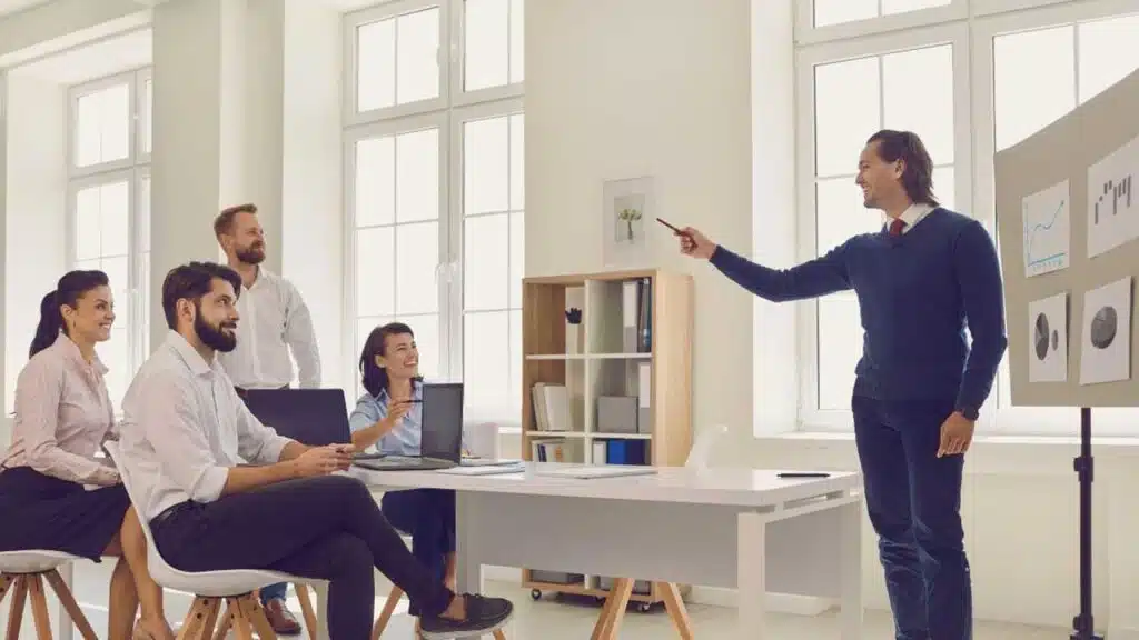 Business team in a meeting with a presenter.