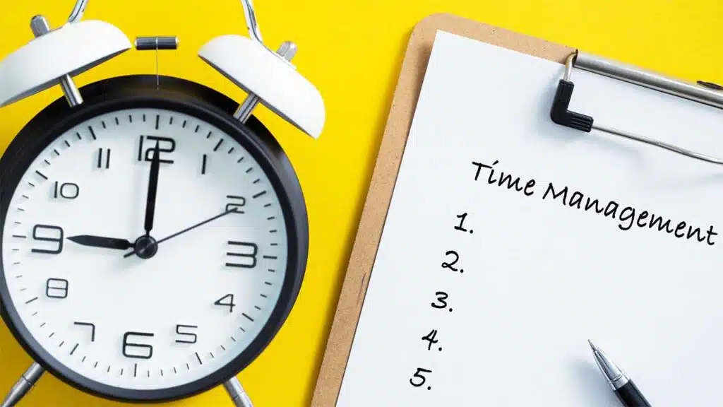 Time management checklist with an alarm clock