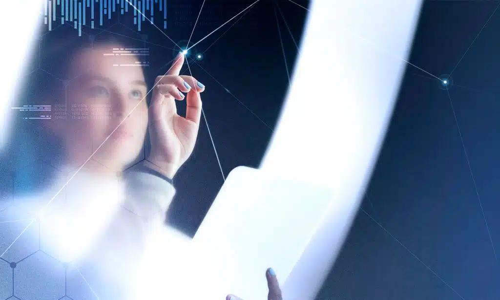 Futuristic image of a woman interacting with a digital interface