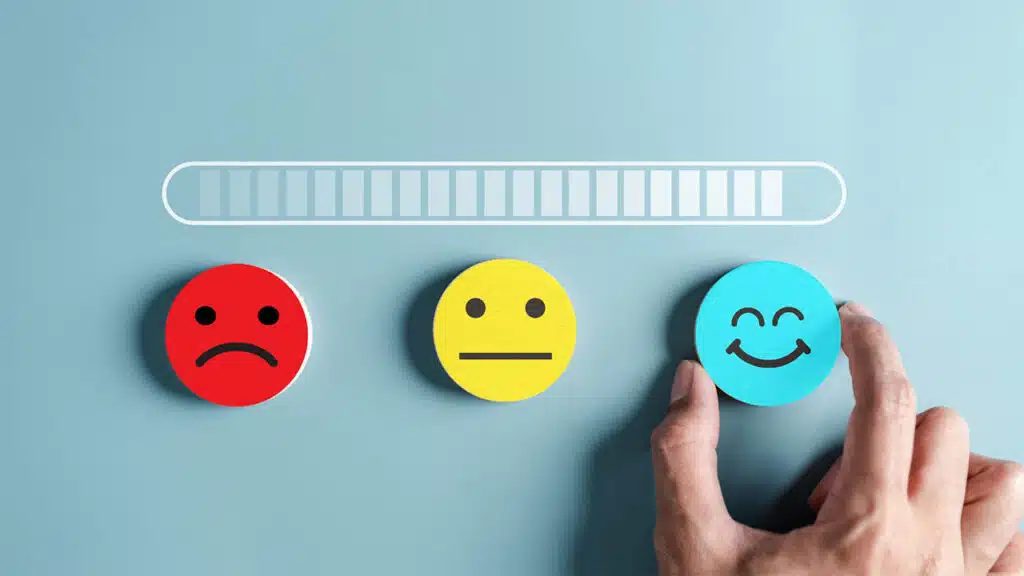 Satisfaction rating scale with three circular face icons
