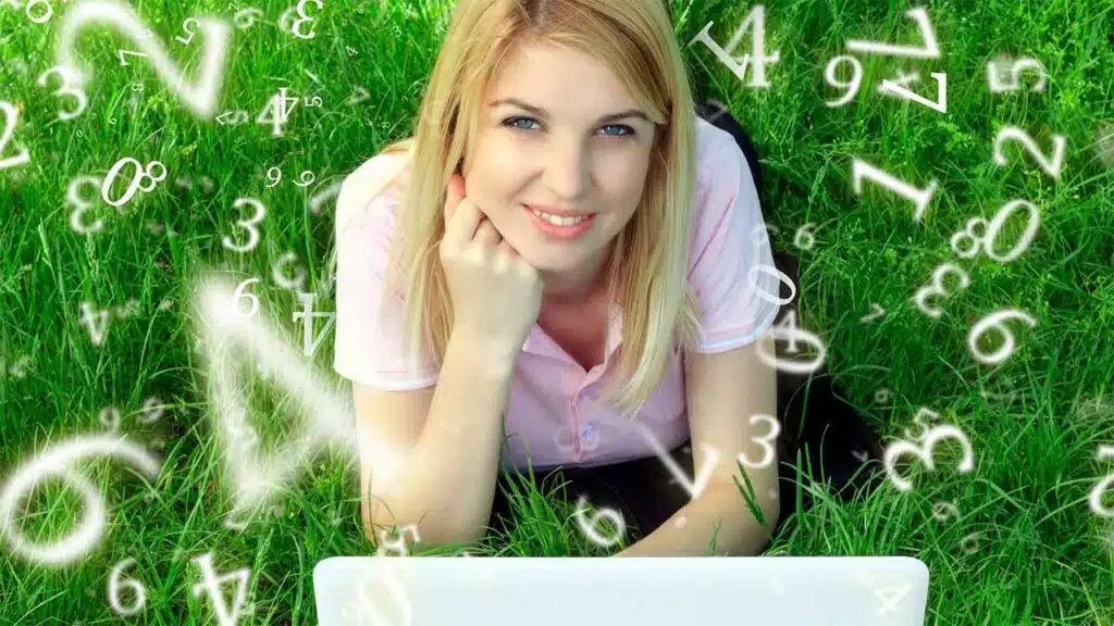 Smiling woman lying on grass with floating numbers around her, symbolizing data analysis, numerology.