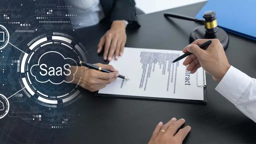 Business professionals signing a SaaS contract
