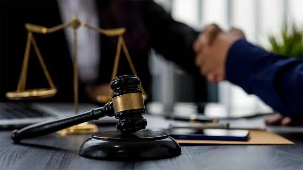 Gavel and scales of justice on a lawyer's desk