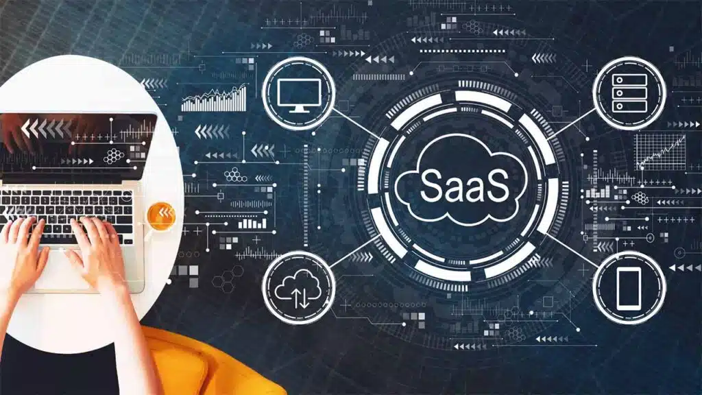 Person working on a laptop with SaaS (Software as a Service) technology concept
