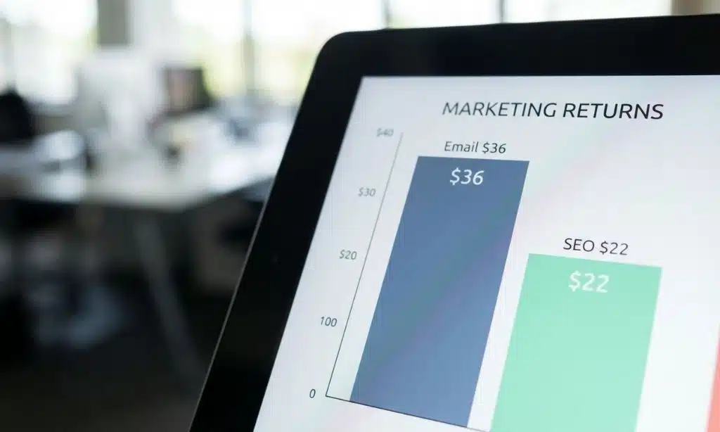 Digital screen showing a comparison of ROI for Email Marketing versus SEO