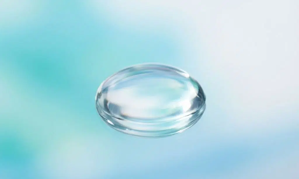Macro shot of a clear serum droplet showing texture and hydration