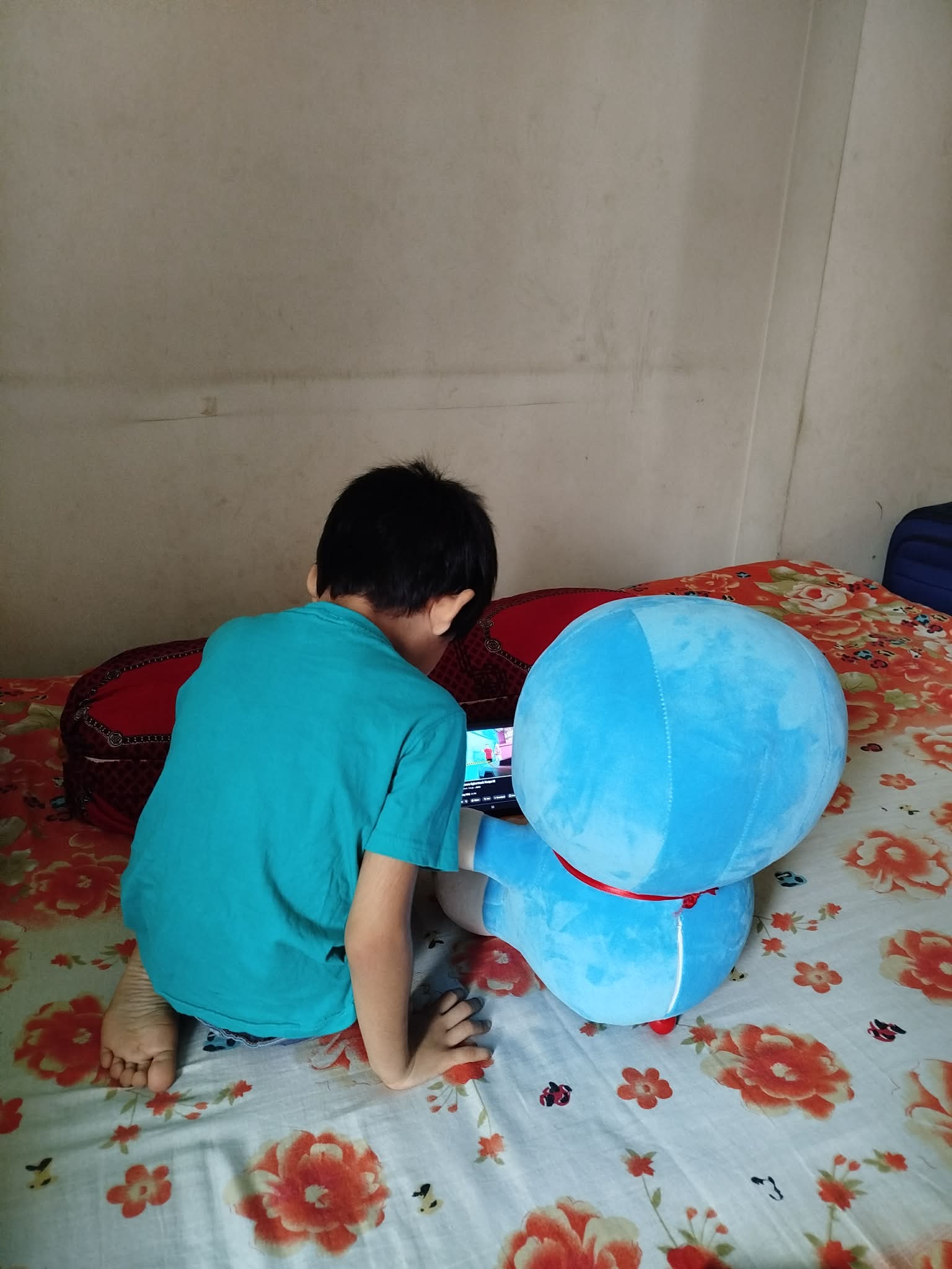 Zayan and Doraemon learning from an app
